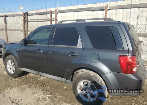 2009 Mazda Tribute Hybrid z USA, uszkodzony, nr VIN 4F2CZ49319KM07138
